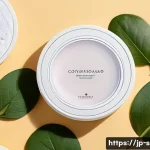 트러블 케어 패드 추천 - A serene skincare setting showcasing a gentle cotton facial pad held delicately by a pair of hands w...